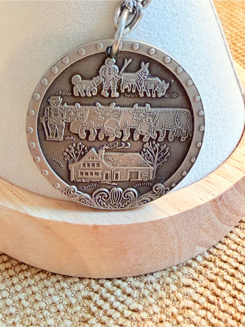 Vintage Swiss pewter relief medallion keychain
